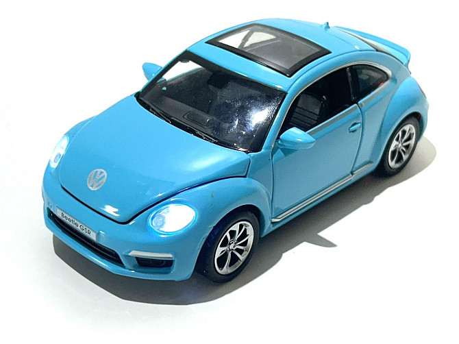 Машинка Автоексперт Volkswagen Beetle 1:32 метал світло/звук відчиняються двері капот багажник Блакитна (12012) Чернигов - изображение 1