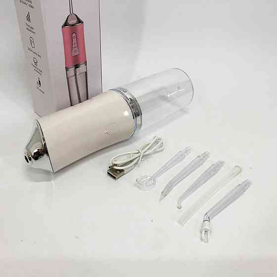Іригатор для чищення зубів та порожнини рота Oral Irrigator з акумулятором та змінними насадками. BC-907 Колір: білий Київ