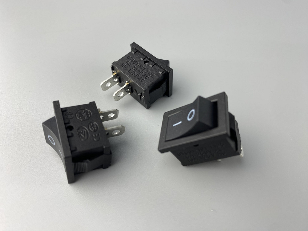 Перемикач клавішний чорний,15 мм 21 мм, 2 ніжки Мукачево - фото 1