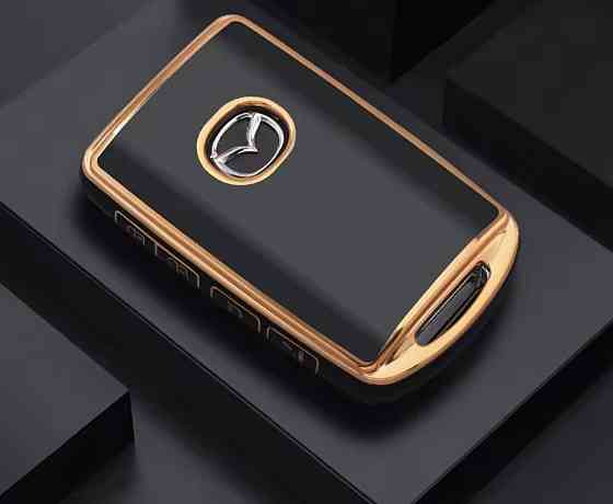 Захисний чохол для автомобільного ключ Mazda на 4 кнопки Чорний із золотистим Сміла