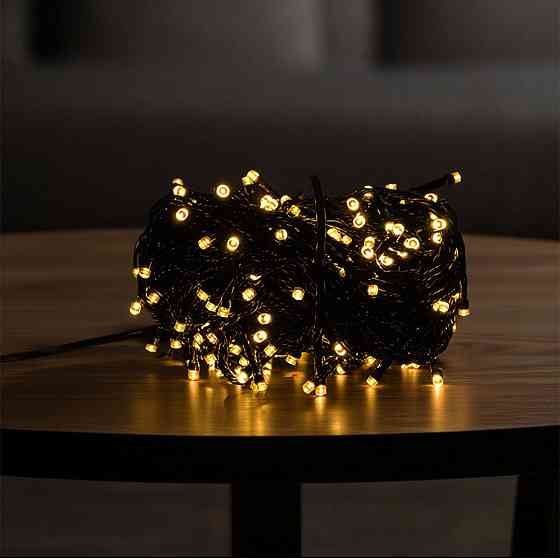 Новорічна гірлянда кімнатна нитка 18 м 180 LED кімнатна гірлянда чорний провід Жовте світло W180LED18MBY Коломыя