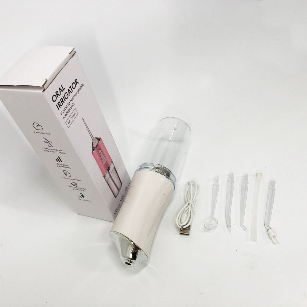 Ирригатор для чистки зубов и полости рта Oral Irrigator с аккумулятором и сменными насадками. Цвет: белый HK-42 Львов - изображение 13
