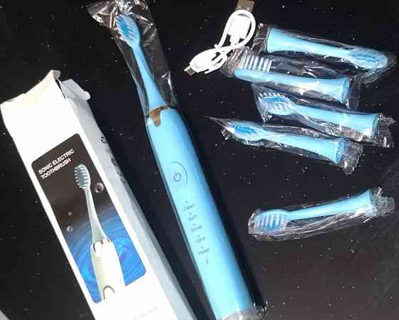 Электрическая зубная щётка + 6 насадок . Харьков