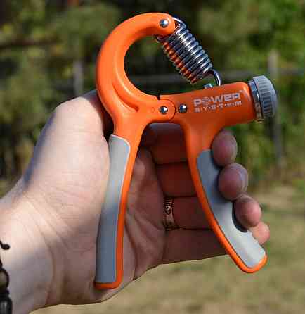 Еспандер кистьовий Power System PS-4021 з регульованим навантаженням 10-40 кг.  Power Hand Grip Orange Кам'янське