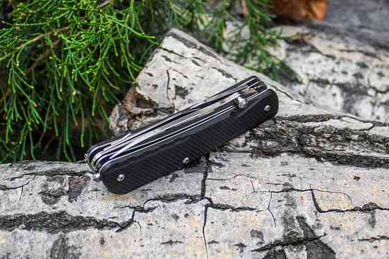 Багатофункціональний ніж Ruike Trekker LD32-B, (8.5 см) 12C27 / G10 чорний, 11 інстр. Київ