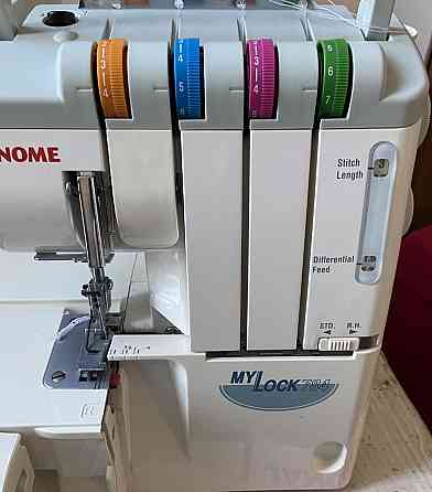 Оверлок брендовий на 4 Нитки металевий з автозаправлянням. Харків