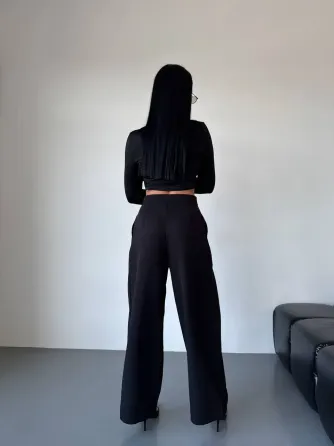 Жіночі брюки палаццо з високою талією — ідеальний варіант для базового гардеробу. Одеса