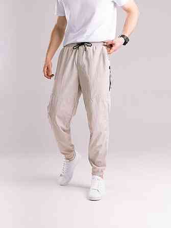 Бежеві чоловічі джогери. Джогери плащівка спорт чоловічі Pobedov Yoxo. Штани джогери з кишенями Київ