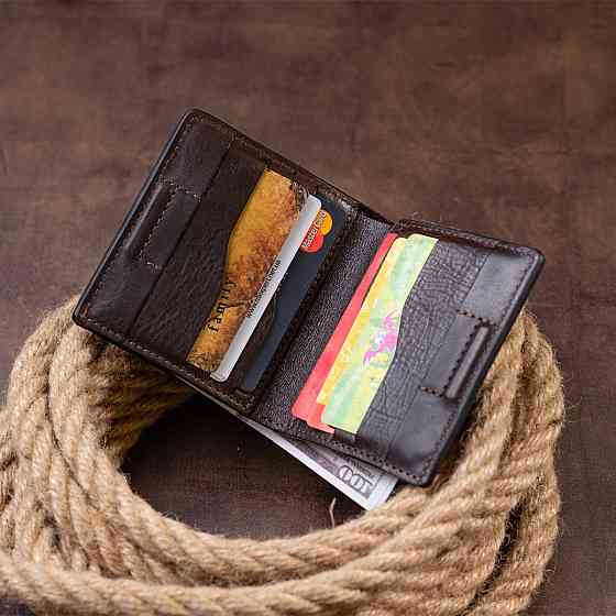 Вертикальне глянсове портмоне з накладною монетницьою GRANDE PELLE 11330 Шоколадне Київ