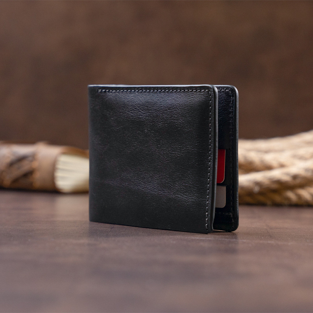 Горизонтальне портмоне в гладкій шкірі без застібки GRANDE PELLE 11311 Чорне Київ - фото 3