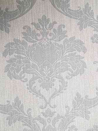 Обои виниловые на флизелине Rasch Ornament 1.06х10 вензеля завитки классика серые 973143 Киев