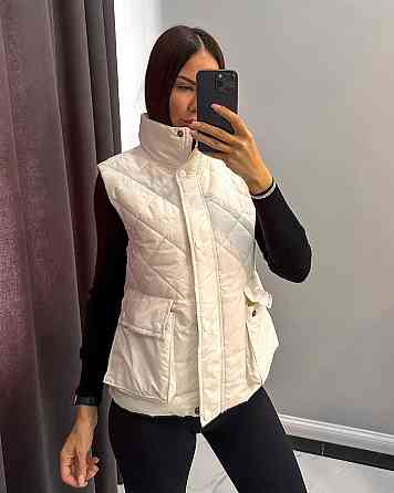 Женская стеганая жилетка плащевка лак на синтепоне Молочный, 48 Одесса