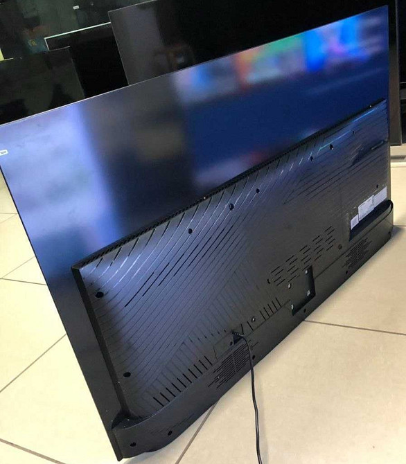 Телевизор Безрамный: 55