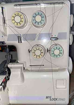 Надежный  металлический 4 ниточный оверлок с самой простой запракой. Харьков