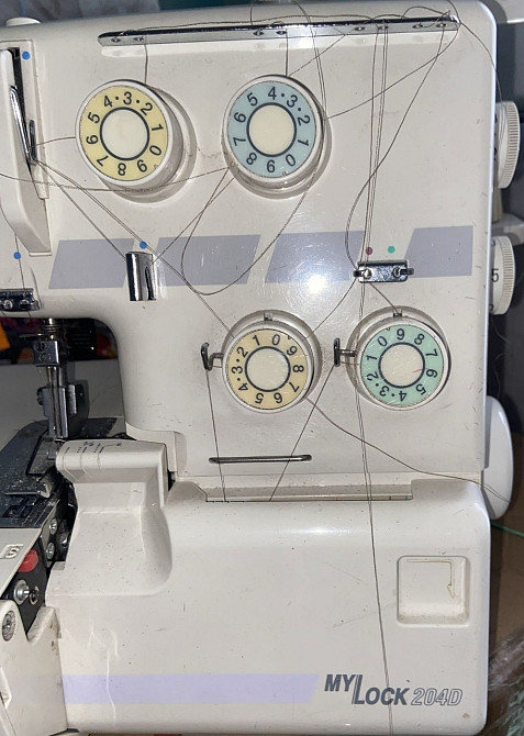 Надежный  металлический 4 ниточный оверлок с самой простой запракой. Харьков - изображение 2