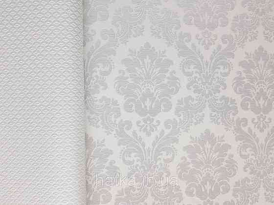 Шпалери вінілові на флізеліні Rasch Trianon Xlll 0.53х10 класика під текстиль вензель завитки срібло на білому Київ