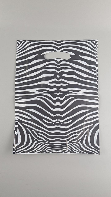 Пакети з вирубаною ручкою (28*40) "ЗЕБРА" Комсерв (100 шт.) Харків - фото 1