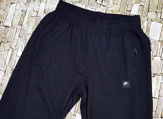 Мужские зауженные штаны Nike,капа Киев