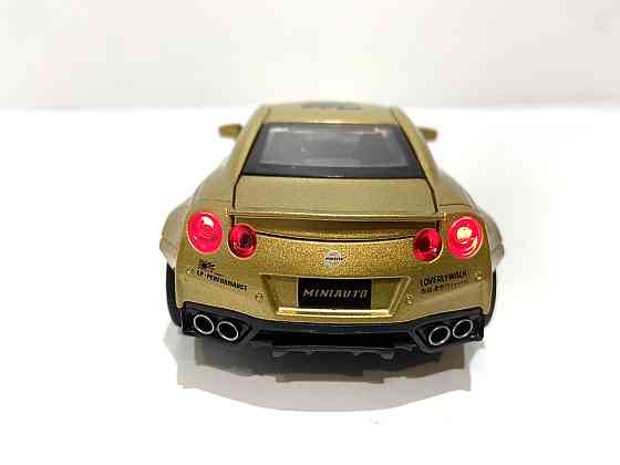 Машинка TK Union Nissan GTR "Auto Expert" металева, світло, звук, інерційна 38071 помаранчева Чернігів