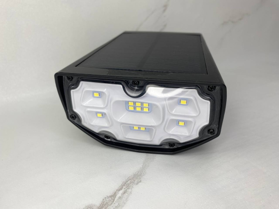 Ландшафтні сонячні прожектори LITOM (12 LED): автономне освітлення, два режими, захист IP67 (Б/В) Київ