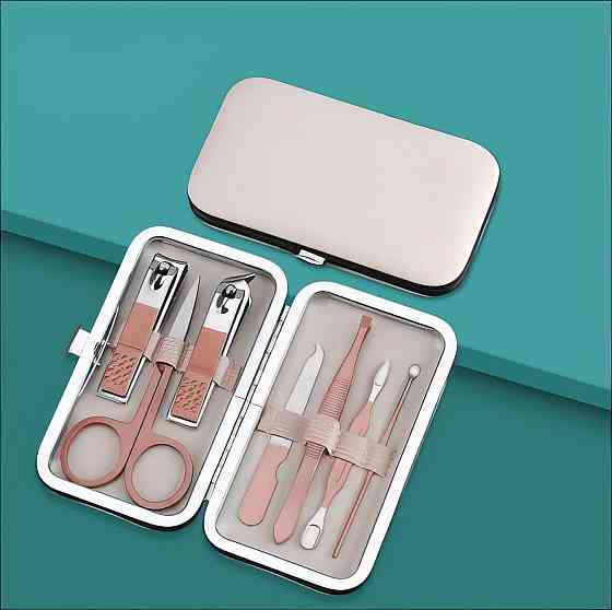 Набор для маникюра и педикюра 7 многофункциональных предметов,пилочка,ножницы,пинцет в кейсе цвет бежевый Каменец-Подольский