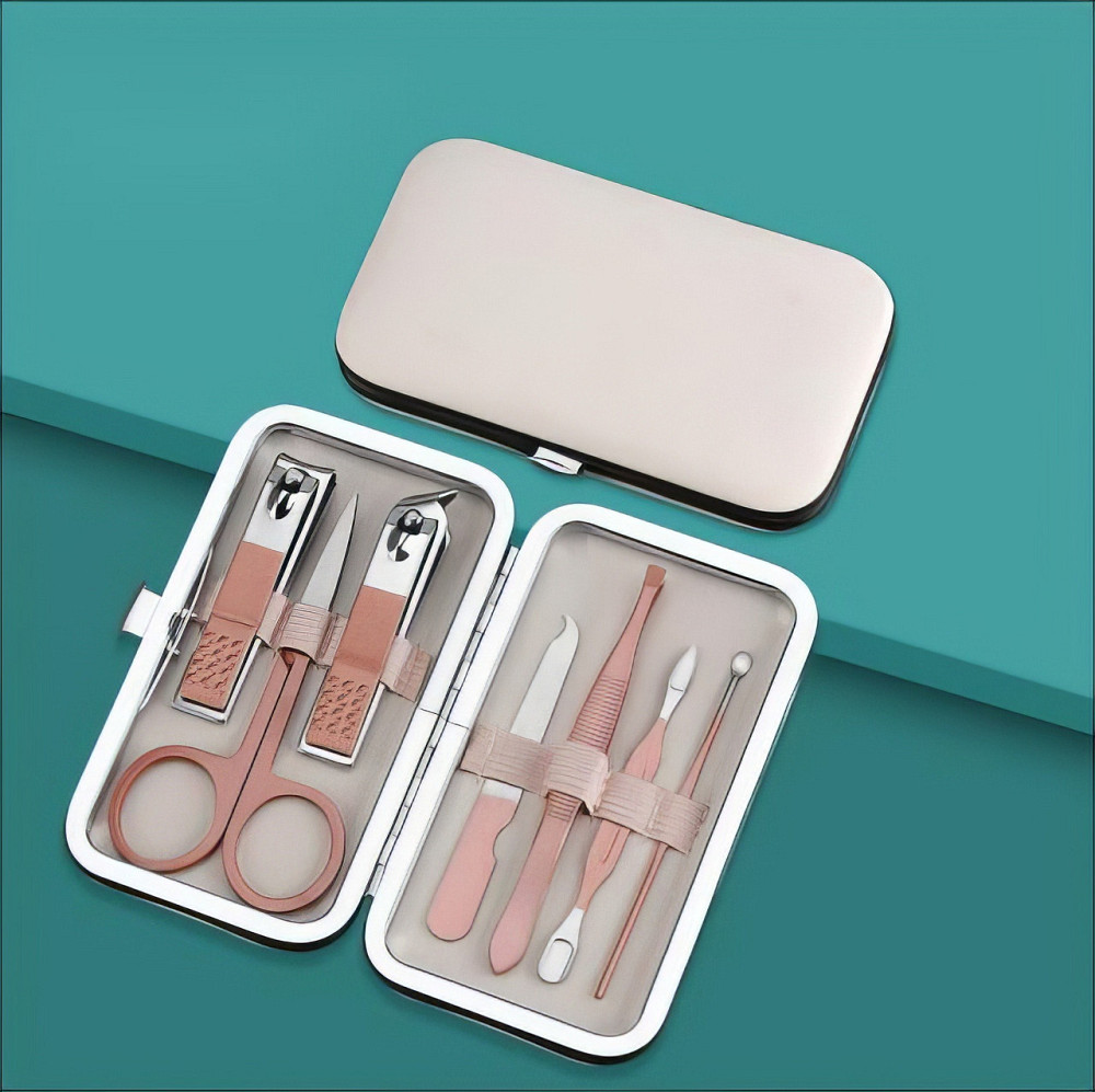 Набір для манікюру і педикюру 7 багатофункціональних предметів, пилка, ножиці, пінцет в кейсі колір бежевий Кам'янець-Подільський - фото 1