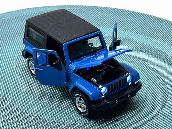 Машина металева Автопром Jeep Wrangler світло звук відчиняються двері капот 1:32 Синя (68331) Чернігів