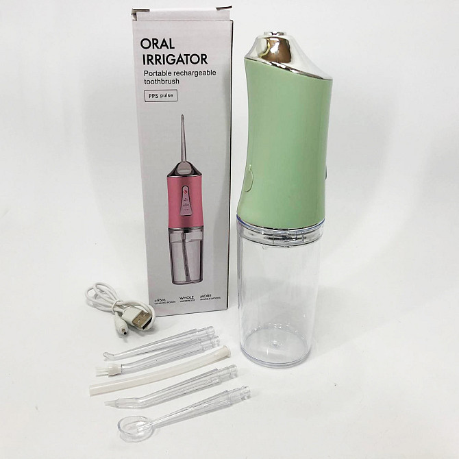 Ирригатор для чистки зубов и полости рта Oral Irrigator с аккумулятором и сменными насадками. Цвет: зеленый IH-24 Львов - изображение 7
