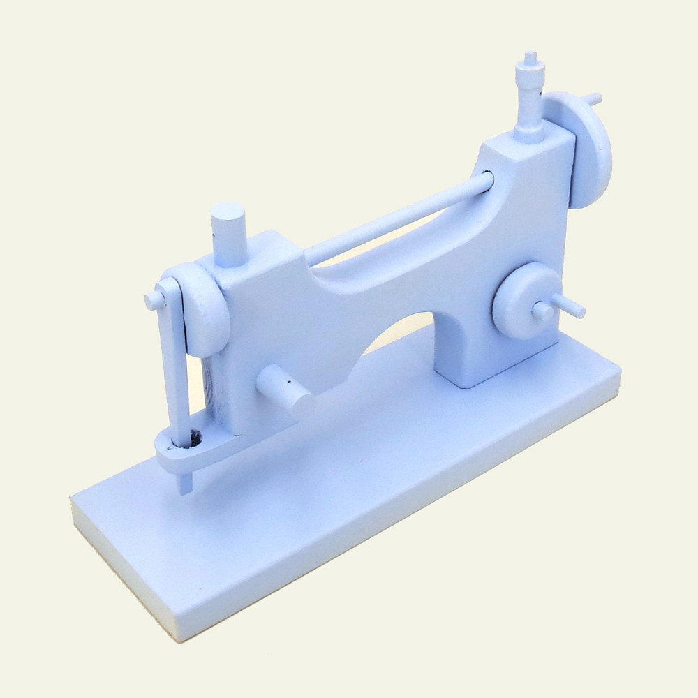 Игрушечная швейная машинка 