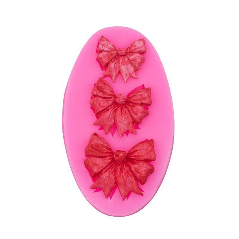 Молд силіконовий Бантики 50 на 85 мм рожевий Київ - фото 7