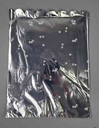 Пакет із малюнком для пакування подарунків (25 * 35) No425 (1) фольгований (ажурний) "Ромашка" (100 шт.) Харків