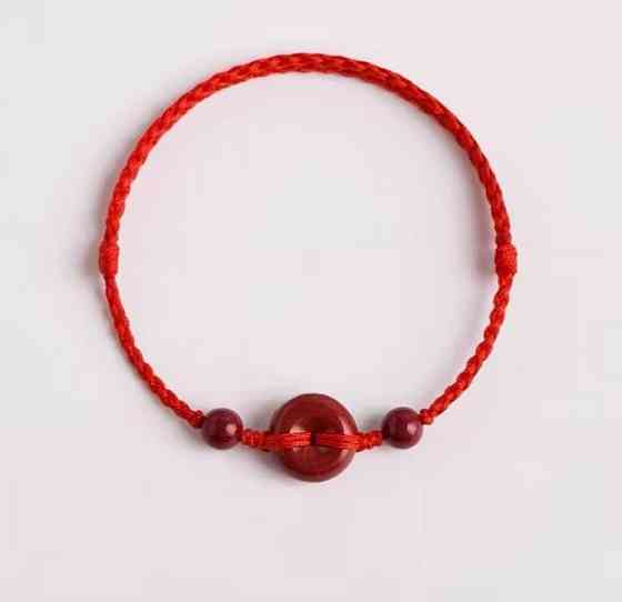 Красный браслет из киновари на плетеном шнурке – талисман удачи и защиты Киев