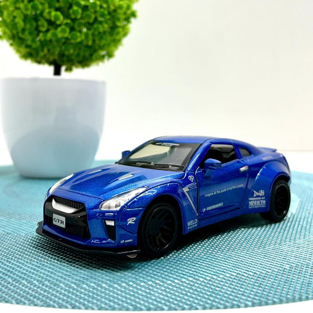 Машинка TK Union Auto Expert Nissan GTR металева світло/звук/інерційна Синя (38071) Чернігів - фото 1