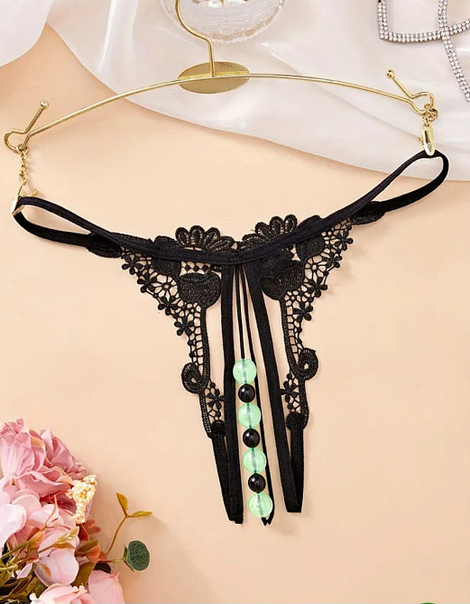 Стрінги з намистинками фосфорні жіночі one size чорний Київ - фото 1