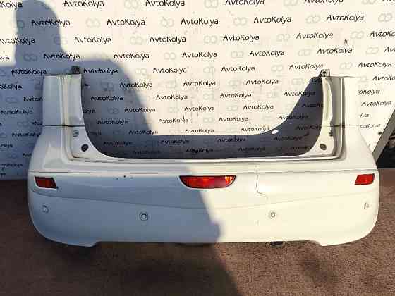 Бампер задній Nissan Note E11 2005-2012 Ковель