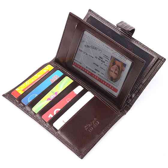 Лаковане чоловіче портмоне з хлястиком із натуральної фактурної шкіри KARYA 21194 Коричневий Київ