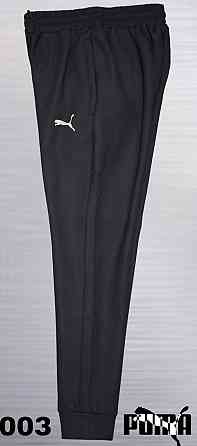 Чоловічі завужені штани під манжет Puma тканина new Tech knit 48 Київ