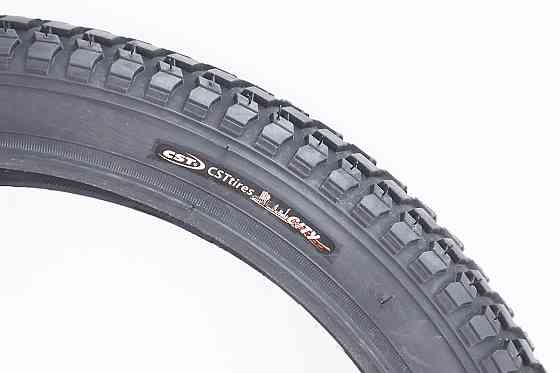 Шина 18"x2,125 (57-355) шипована C712 Київ