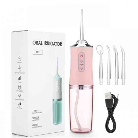 Іригатор ORAL IRRIGATOR з насадками, регулюванням тиску та зручністю для щоденної гігієни зубів Київ