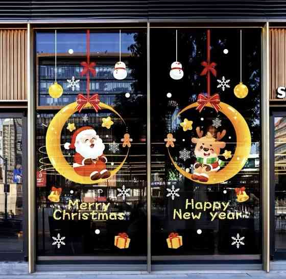 Новорічні наклейки на вікна Санта Клаус та Олень на місяці розмір наклейки 60 на 45см силікон різнокольоровий Київ