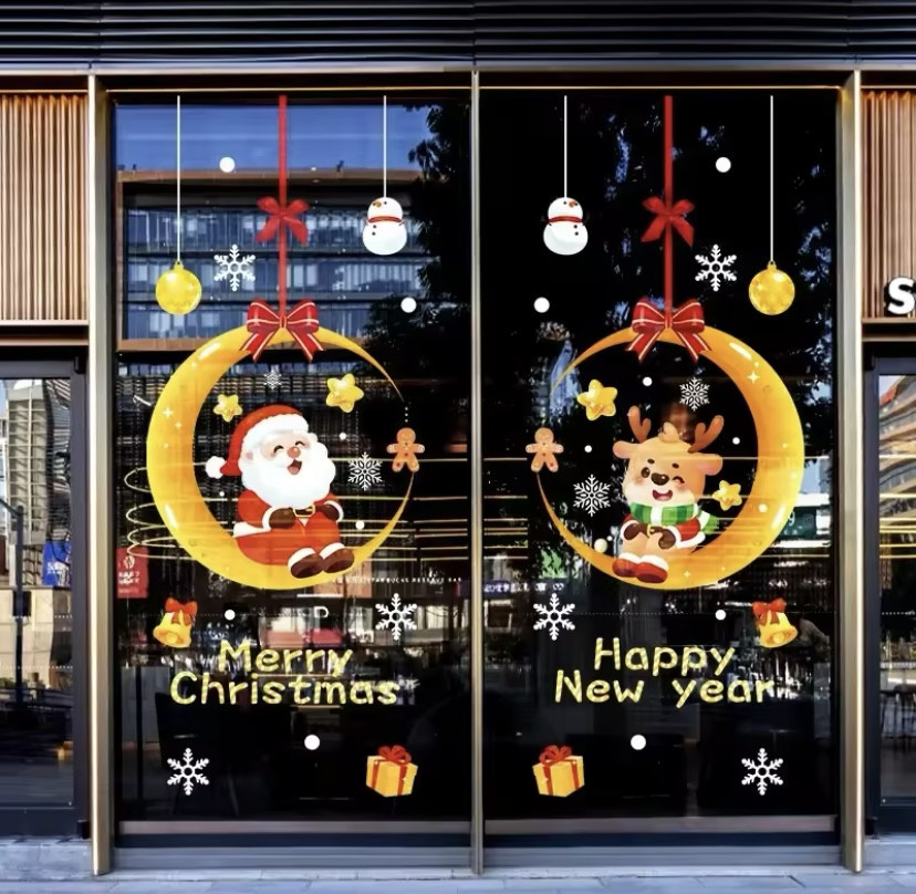 Новорічні наклейки на вікна Санта Клаус та Олень на місяці розмір наклейки 60 на 45см силікон різнокольоровий Київ - фото 1