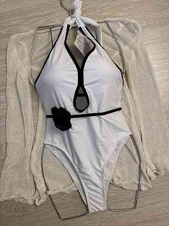 Жіночий суцільний купальник із квіткою Білий M Харків