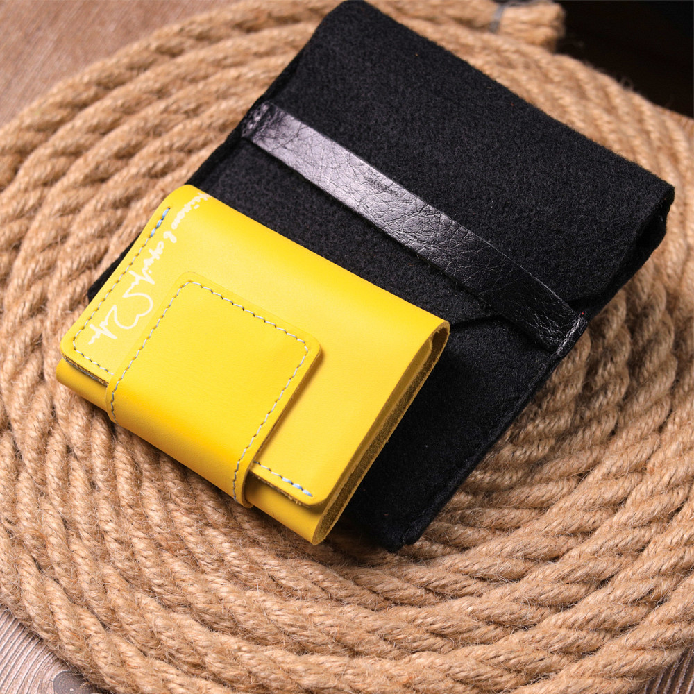 Компактне шкіряне портмоне в три додавання комбі двох кольорів Серце GRANDE PELLE 16730 Жовто-блакитне Київ - фото 1