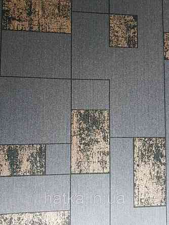 Текстильні шпалери на флізеліновій основі Cador Rasch Textil086545 сіро-бежева основа квадрати бронза Київ