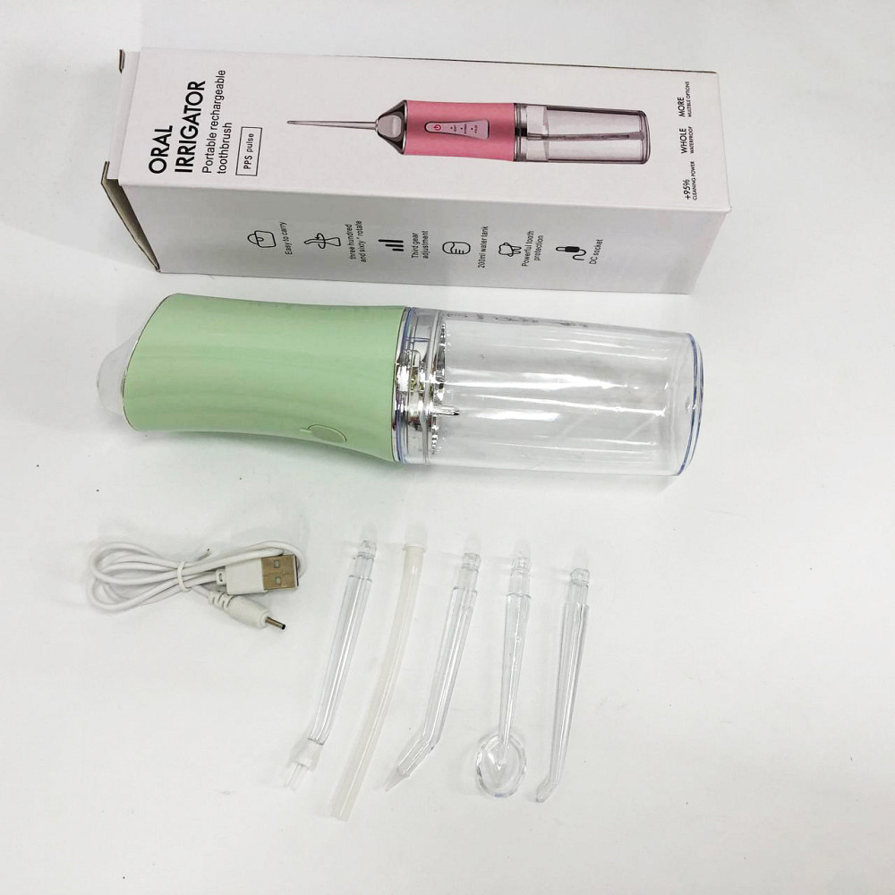 Ирригатор для чистки зубов и полости рта Oral Irrigator с аккумулятором и сменными насадками. Цвет: зеленый VD-91 Львов - изображение 4