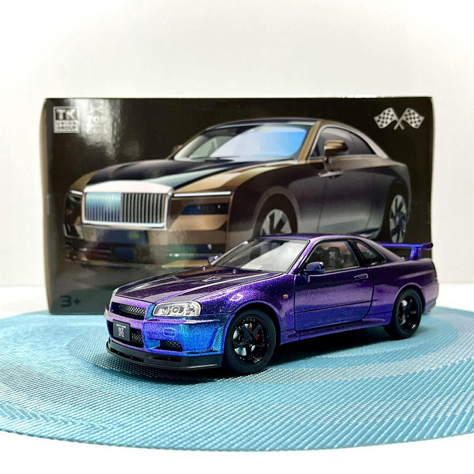 Машинка металева Авто Експерт Nissan GT-R 1:24 світло/звук відчиняються двері капот багажник Фіолетова (1990-21) Чернігів - фото 2
