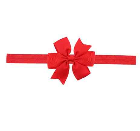 Дитяча червона пов'язка з бантиком - на резинці, окружність від 30см до 48см, бант 9см Київ