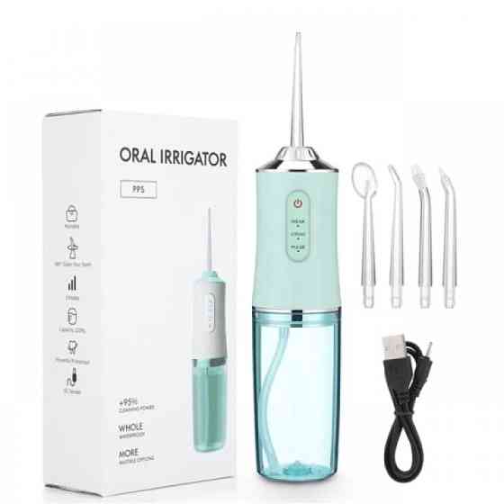 Іригатор ORAL IRRIGATOR з насадками, регулюванням тиску та зручністю для щоденної гігієни зубів Київ