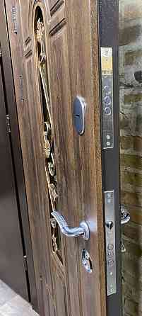 Двери вуличні Redfort, модель Арка з ковкою , комплектація Стандарт плюс (2 контура Київ