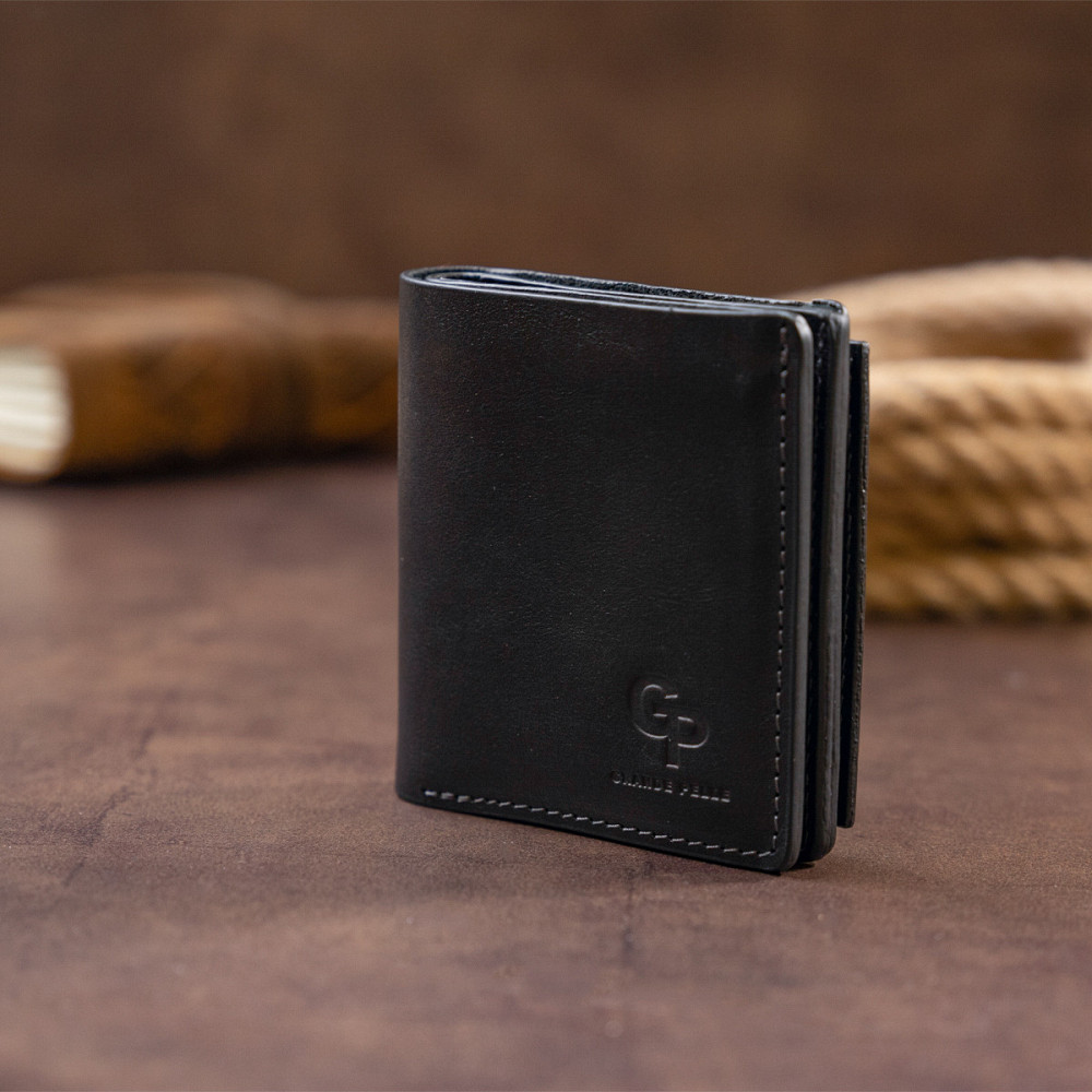Вертикальне глянсове портмоне з накладною монетницьою GRANDE PELLE 11329 Чорне Київ - фото 7